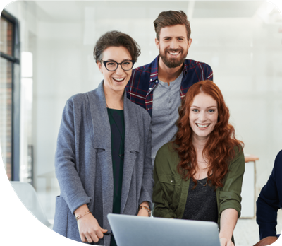 Marketing team gathered around a laptop