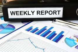 Printed weekly report with bar charts
